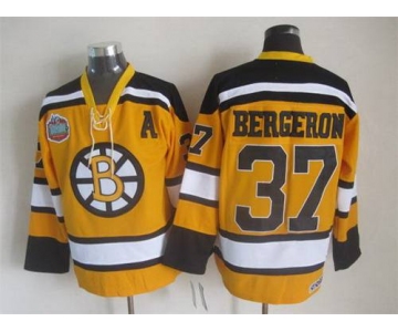 Men's Boston Bruins #37 Patrice Bergeron 2009-10 Yellow CCM Vintage Throwback Jersey